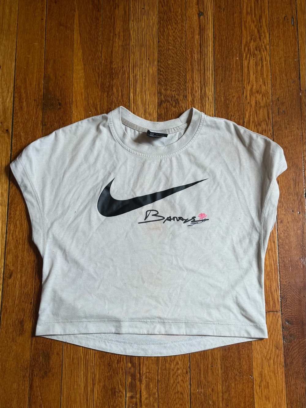 Nike White Cropped Swoosh Tee with Black Logo and Pink Accent